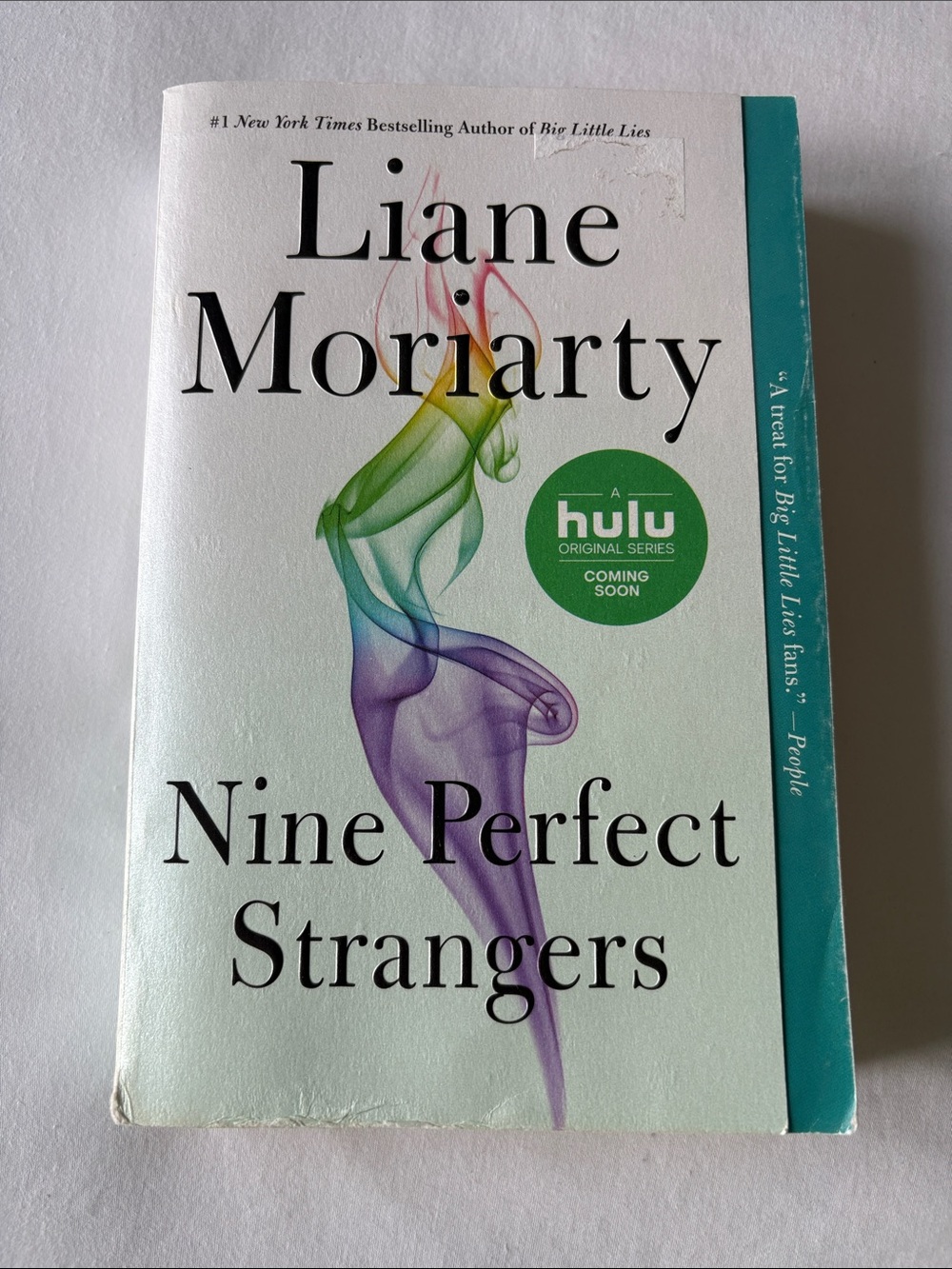 Liane Moriarty "Nine Perfect Strangers" Paperback - Teal & Multicolor Cover